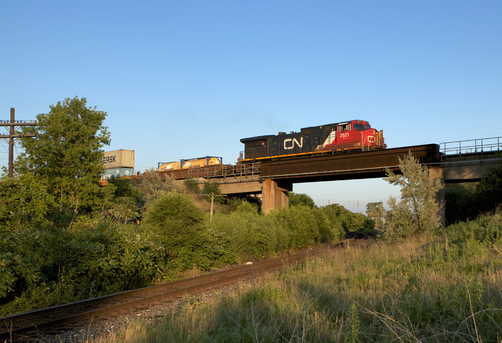 A single-unit CN Q14921 07 cruises westbound over the Mactier Sub.