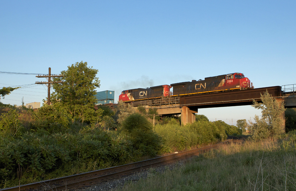 CN stacker Q19051 02 heads west for a final destination of Brampton Intermodal Terminal.