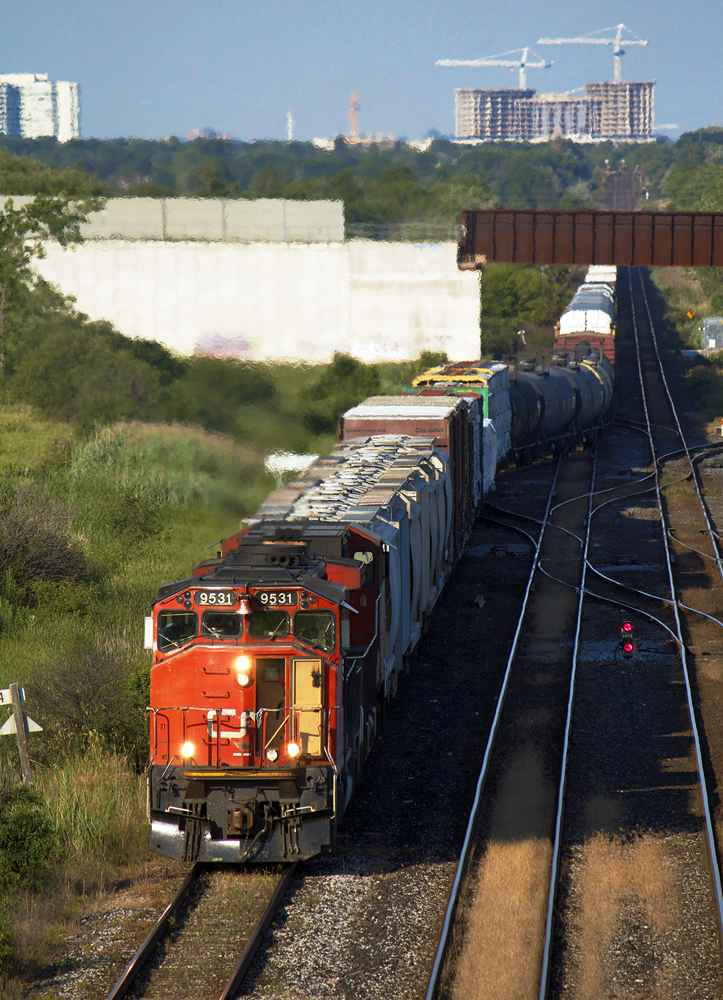 CN train X316 at Snider accelerates for the ascent into Macmillan Yard.