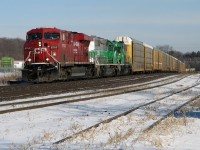 CP 241 approaches the begin/end CTC sign Guelph Jct, with two CITX leasers assisting the GE to pull a good sized train up the Niagara Escarpment.