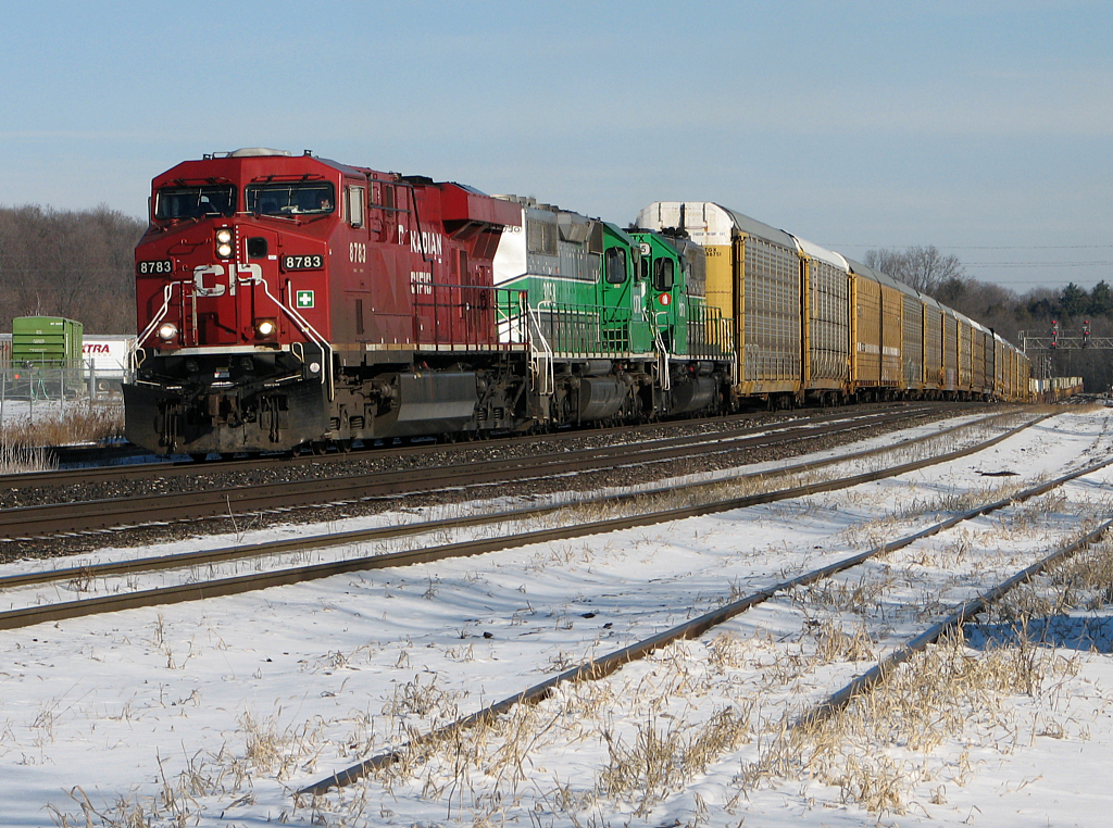 CP 241 approaches the begin/end CTC sign Guelph Jct, with two CITX leasers assisting the GE to pull a good sized train up the Niagara Escarpment.