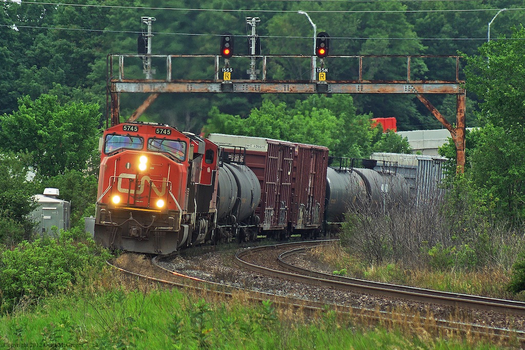 After the priority westbounds are clear CN 376 heads up the Afternoon eastbound traffic at the Doncaster Signal Bridge.
