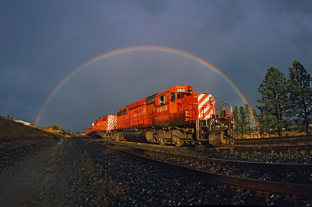Under the rainbow:  A double rainbow encircles a pair of venerable CP Rail SD40-2s after a good rainstorm in Cranbrook, British Columbia, on October 4, 2010. This image was on one of my last rolls of film before the switch to digital.