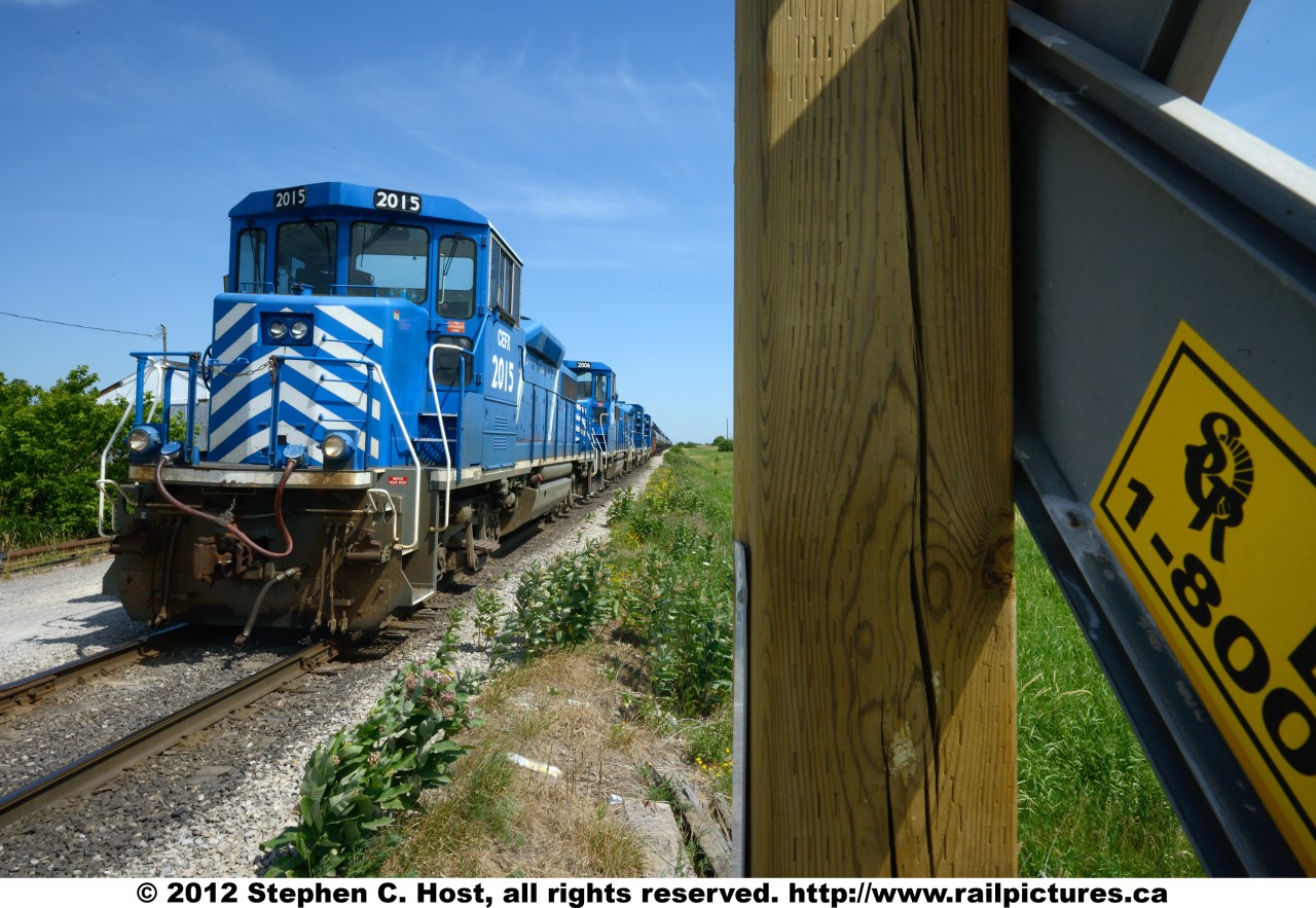 Another view of SOR 598 parked at the station at Garnet, waiting for the crew to arrive for the day road switcher.. note the SOR logo on the crossbuck.
