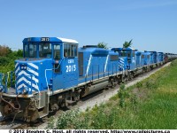 Four GP20D's (2019, 2014, 2006, 2015) make up a matching set of power on the Nanticoke Road Switcher. The train sits parked at the Garnet yard/station, waiting for the crew of the day yard switcher (599) to arrive.. The SOR Hagersville sub is very busy these days, 599's duties are to switch US Steel Lake Erie and Imperial Oil, and crew informed me that a night job also switches Imperial Oil