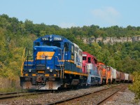 A pair of RLK units along with a pair of Stelco switchers tag along for the ride on CN-SOR's joint bottle train, as the train moves east through Dundas, Ontario. 