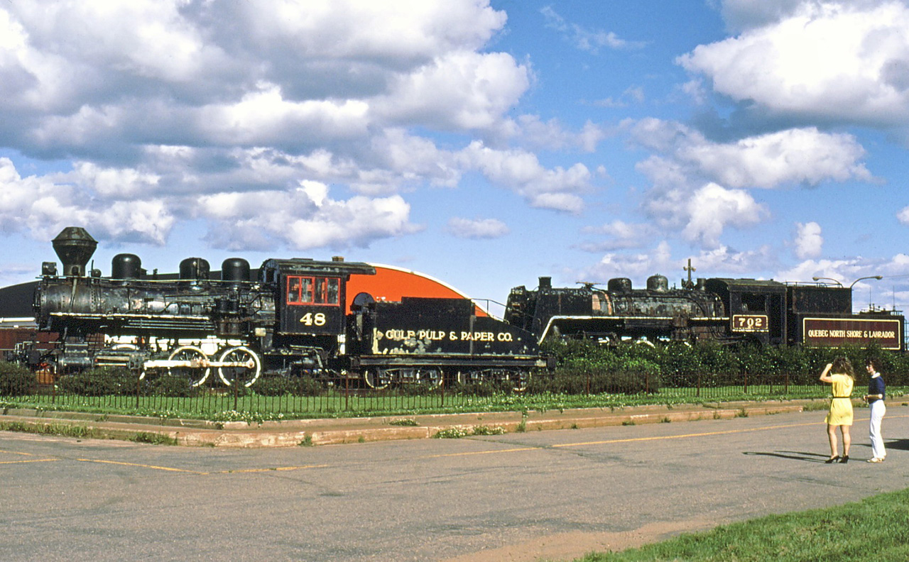 2 old steamers in a park at 7-Iles,702 was bought from ONR.