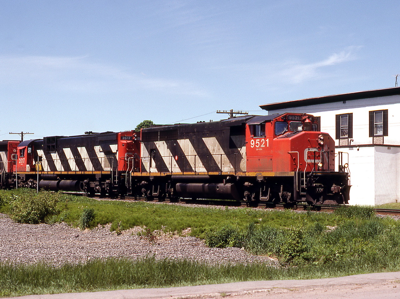 CN 306 with 9621 as 3rd unit passes through Dave at 30 mph.
