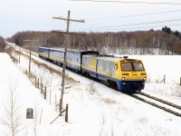 VIA 23 passing rte 161 M75,in early 1992,they found out axle problems on LRC cars so they were withdrawn from service and replaced with old rolling stock for 3-4 weeks until all the cars were checked.