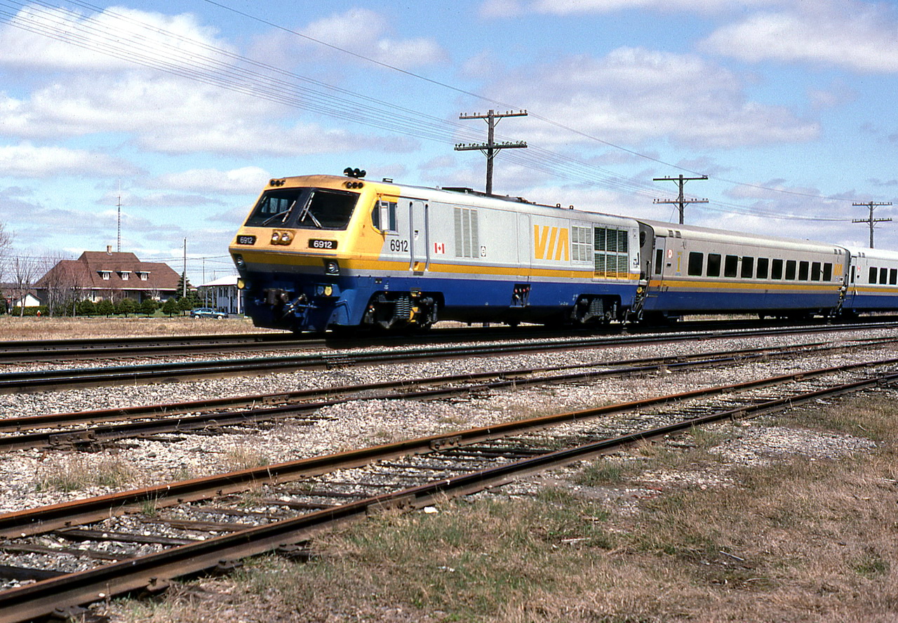 VIA 23 passes by at 70mph with horns blaring 200`from the crossing.