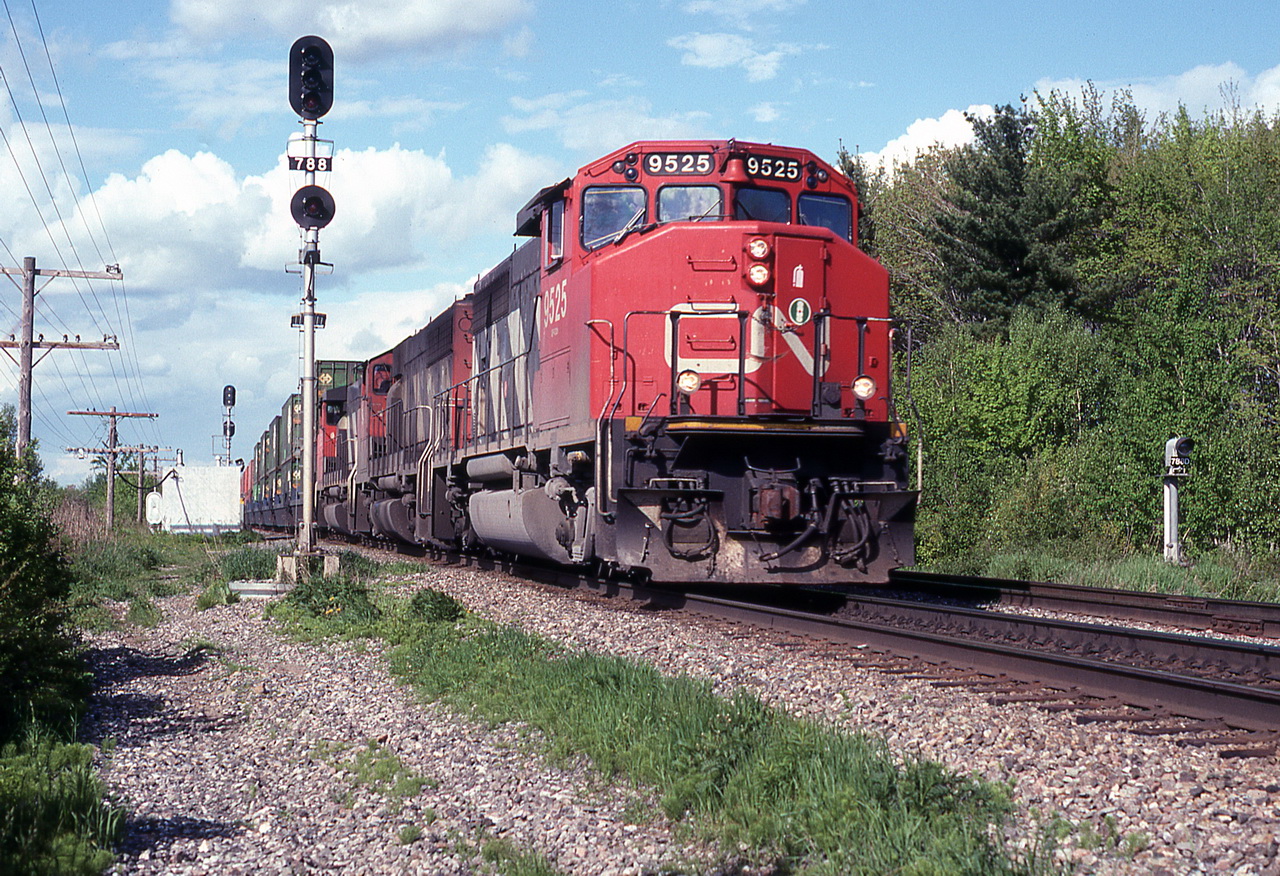 CN 207 eases up on the throttle as it begins the 1 mile downgrade.