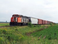 CN 514,s gettting underway for its next switching job at Aston jct after having let VIA 25 pass by.