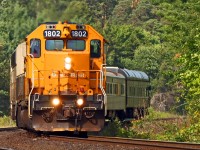 ONR 1802 leads 698 south through Martins with the Mother Parker's "Pacific" observation car in tow.