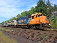 ONR 1802 leads 698 south through Martins with the Mother Parker’s “Pacific” observation car in tow, although it is hardly evident in this view as it it partway around the bend.