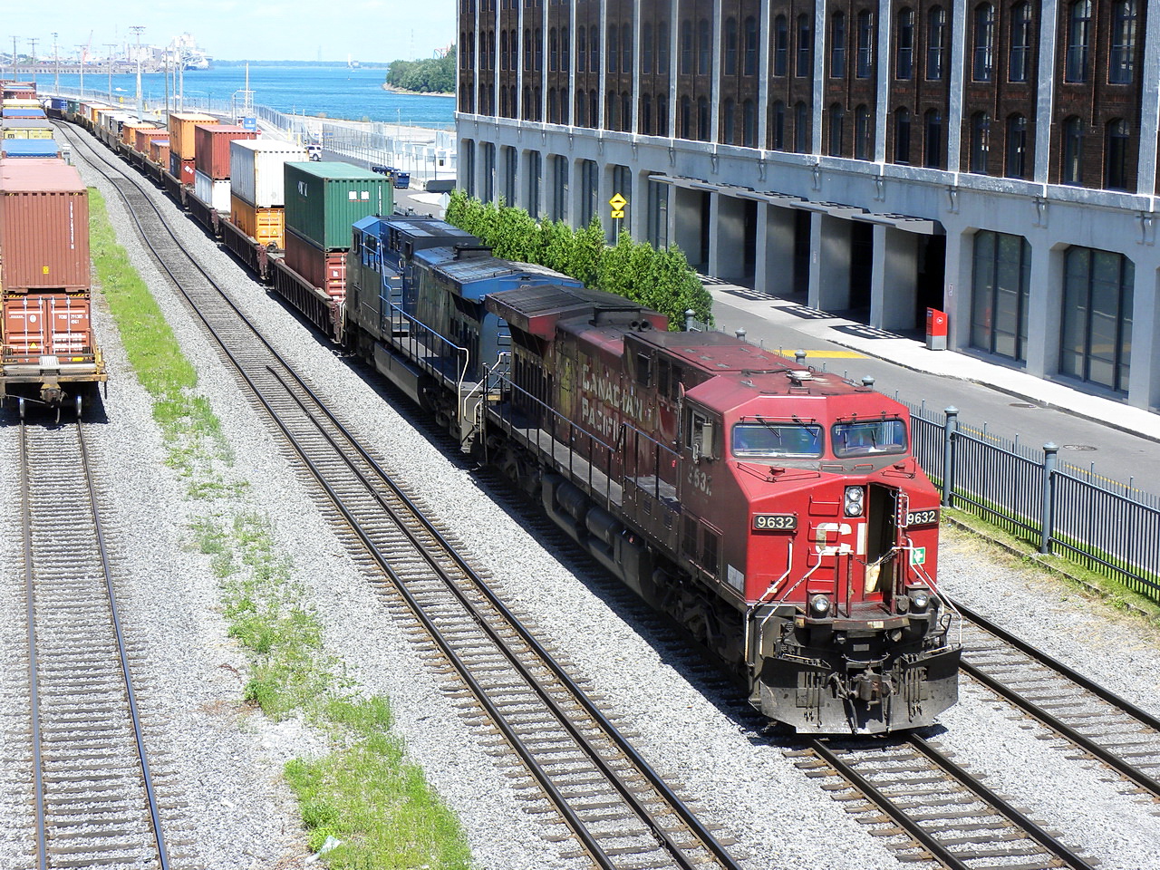 CP 9632 & CEFX 1027 bring a long string of containers from Hochelaga yard.