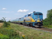 VIA 25 hits the crossing at c 80 MPH,10 minutes to Drummond station.