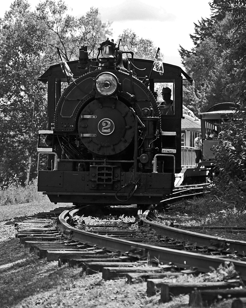 After being spun on the turntable at the far end of the line, old Number 2 has run around its train and is now backing up to rejoin it for the run back to Rotary Village Station.