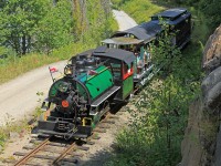 The Portage Flyer chugs its way up out of the dip on its way back to Rotary Village Station.
