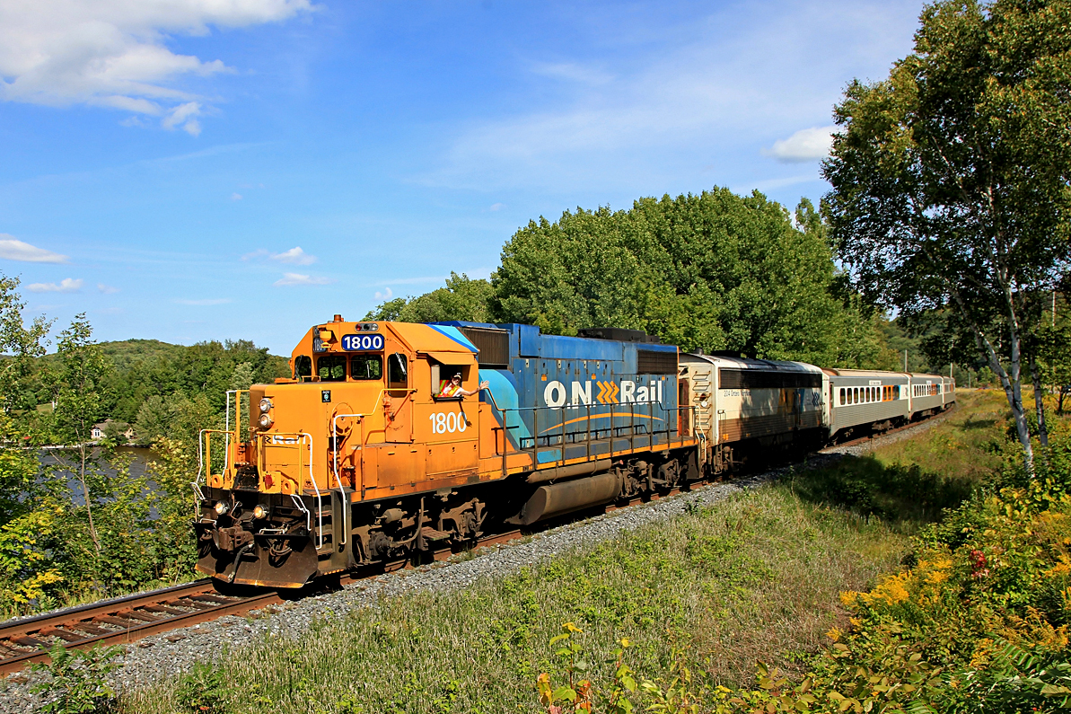 James runs a Facebook group called Railfanning the Ontario Northland Railway and could certainly be called a Northlander Nutbar, so he's right in his glory here, waving at me from the left seat of ON 1800 southbound with 698 at Mile 144 of the CN Newmarket Sub!