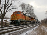 CN 391 waiting on it's conductor after making a lift with BNSF 509 - BNSF 6946 - NS 7555 and 159 cars