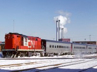 CN 3152 with Toronto to Windsor train 141 arrives on time at Windsor's Walkerville station February 12, 1976.