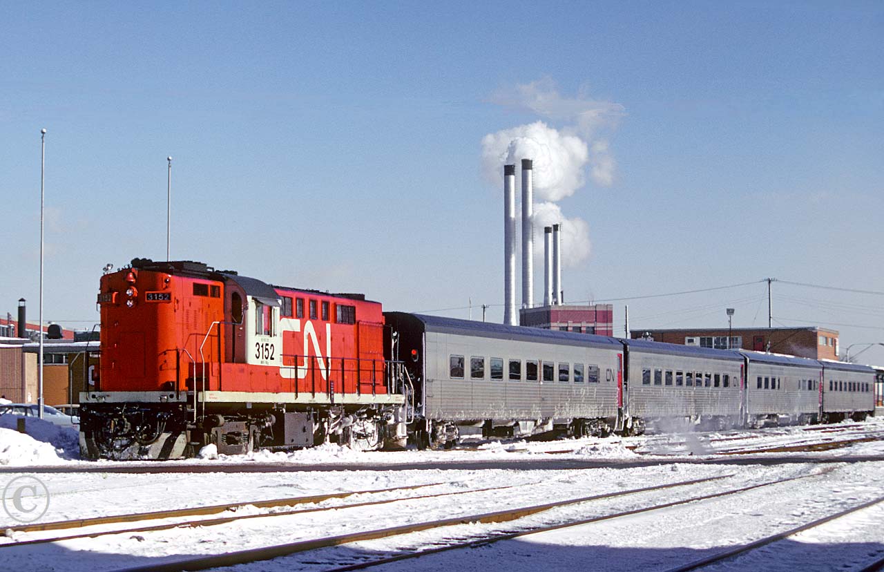 CN 3152 with Toronto to Windsor train 141 arrives on time at Windsor's Walkerville station February 12, 1976.