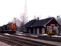 CN 387 rolls past the station at Caledonia