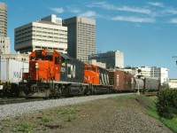 CN 5529 and 5264 bring train 403 through downtown Winnipeg