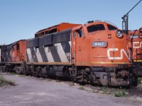 CN 9167 modified for plow service sits with CN 3720 at the shops in Belleville