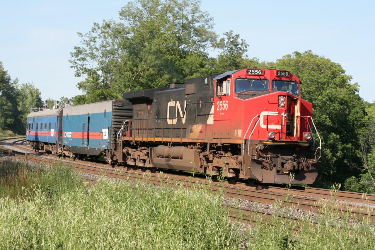 A CN test/engineering train gets underway after an eastbound passed on a beautiful summer day.