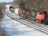 A CN eastbound freight (possibly CN 330) kicks up a bit of snow as it approaches the Grand River followed by Brantford and points east. This was the last train I shot in 2008.