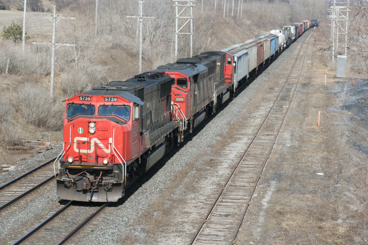 A CN westbound rolls through Beachville, Ontario en-route to London and Sarnia.