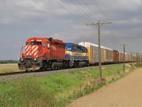 CP 5926 and DME 6201 lead westbound train 147-05 at mile 83.64 on the CP's Windsor Sub May 5, 2012.