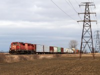 CP 6079 and 5687 power train 245 westward at mile 91.79 on the CP's Windsor Sub, Belle River Ontario February 19, 2012.