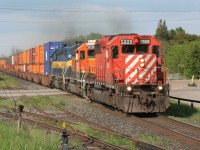 The first train I shot after being back in Ontario after a trip to Peru. It was nice to see this consist heading west. Here we see CP 5909 West storming past the feed mills and what is now a gym and storage units. Power is CP5909-CITX3036-ICE6422.