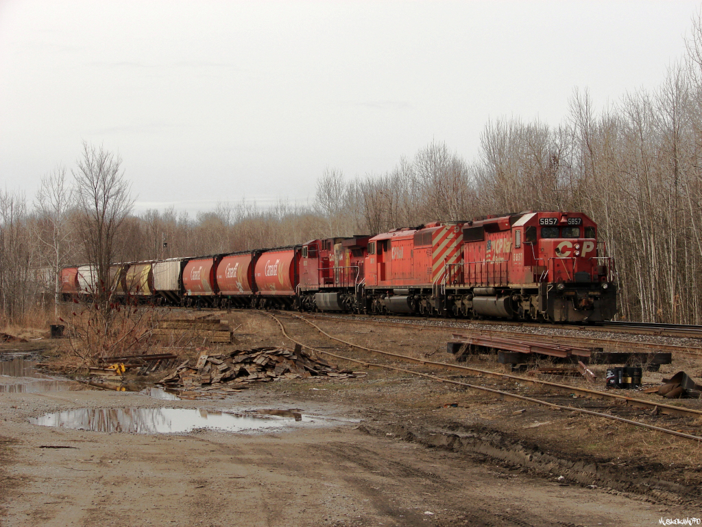 CP 5857 North pulling into the siding at Medonte with 221's freight, clearing up for a meet with train 114 on a cool early spring morning.