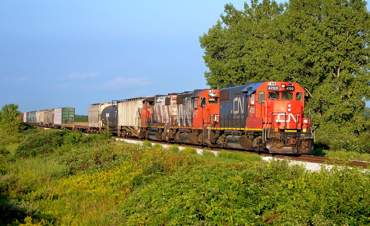 CN 439 led by a trio of Geeps, returns westbound towards Windsor from its daily trip to London.
