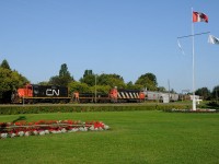 CN's 07:30 day job crosses James Street, enroute to servicing the "Mission industries". Today only 30 cars are in tow, mostly grain for the Mission and Cargill elevators plus a tank car for McAshphalt.