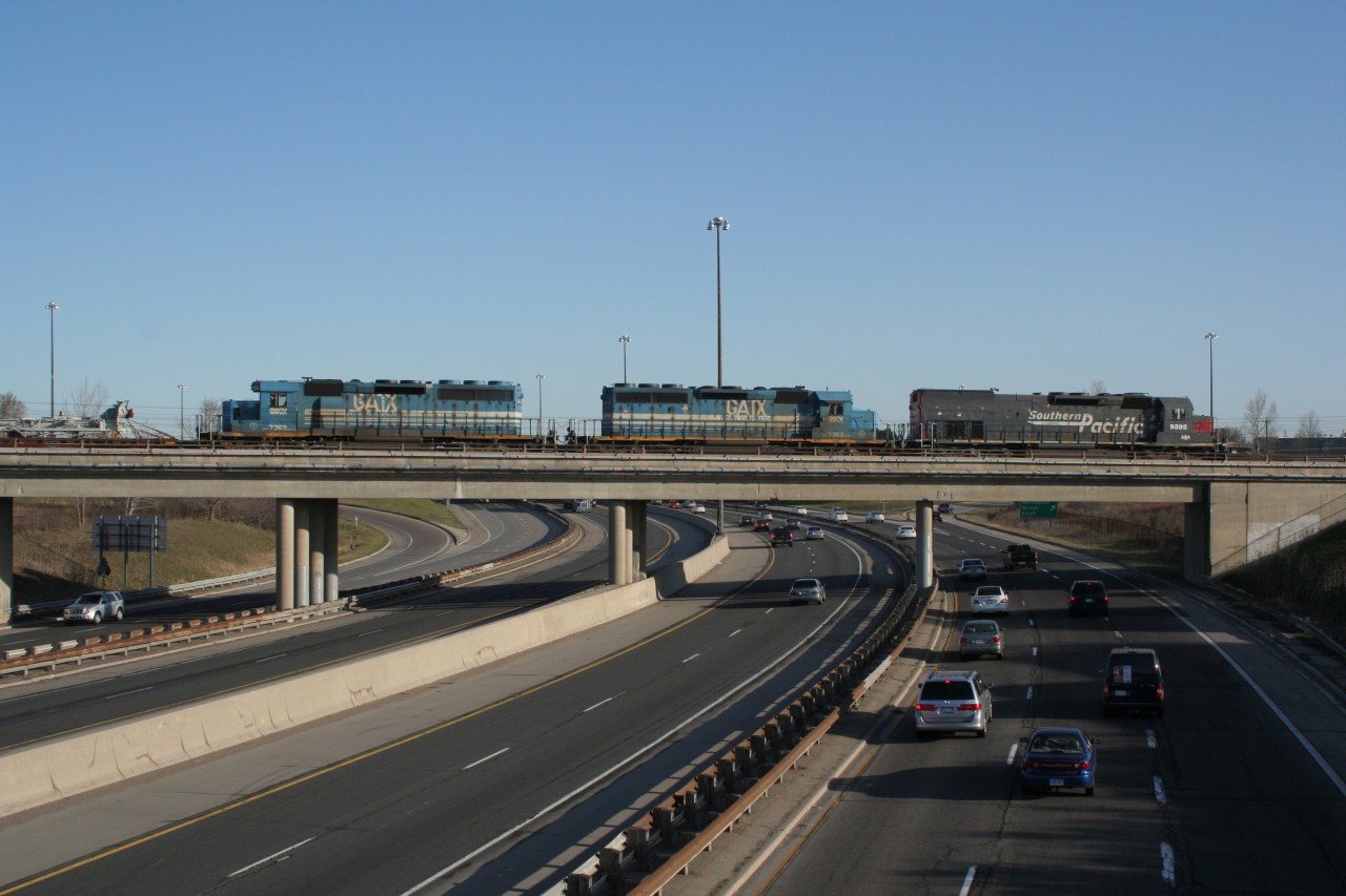 GEXR 432 does its daily morning work out of Kitchener yard. Here we can see 432 with GEXR9392-GSCX7362-GSCX7369 over the Conestogo Parkway (Highway 86).