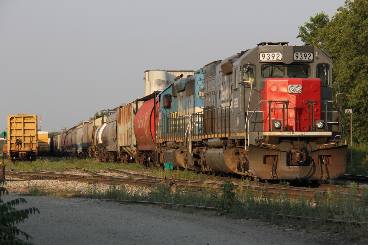 GEXR 431, with 9392 on the point, tied down in Kitchener yard on a warm Friday evening.
