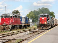 GEXR 9392 leads train no. 431 through Kitchener, while several engines for local assignments await their next duties on the local engine tracks.