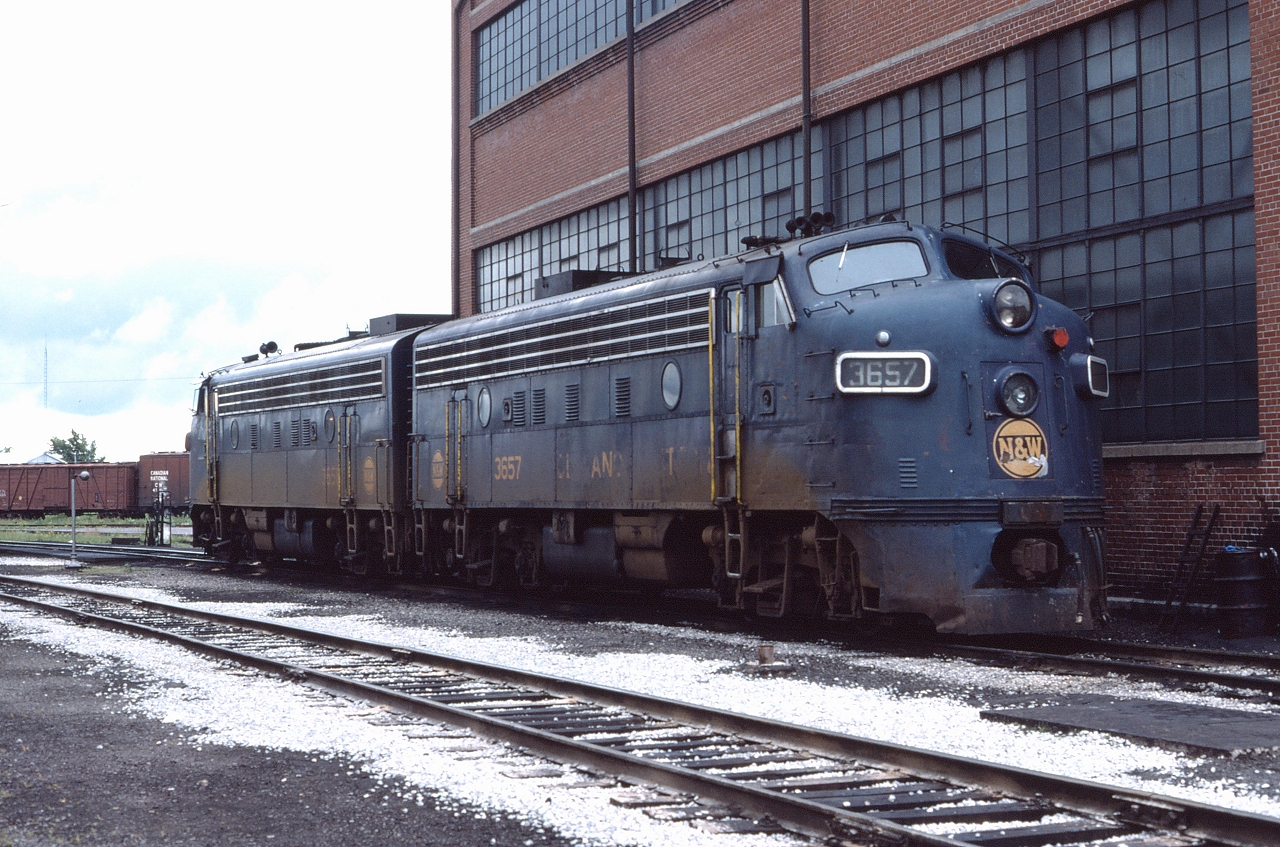 N&W 3657 and N&W 3658 idle outside the shop at Fort Erie