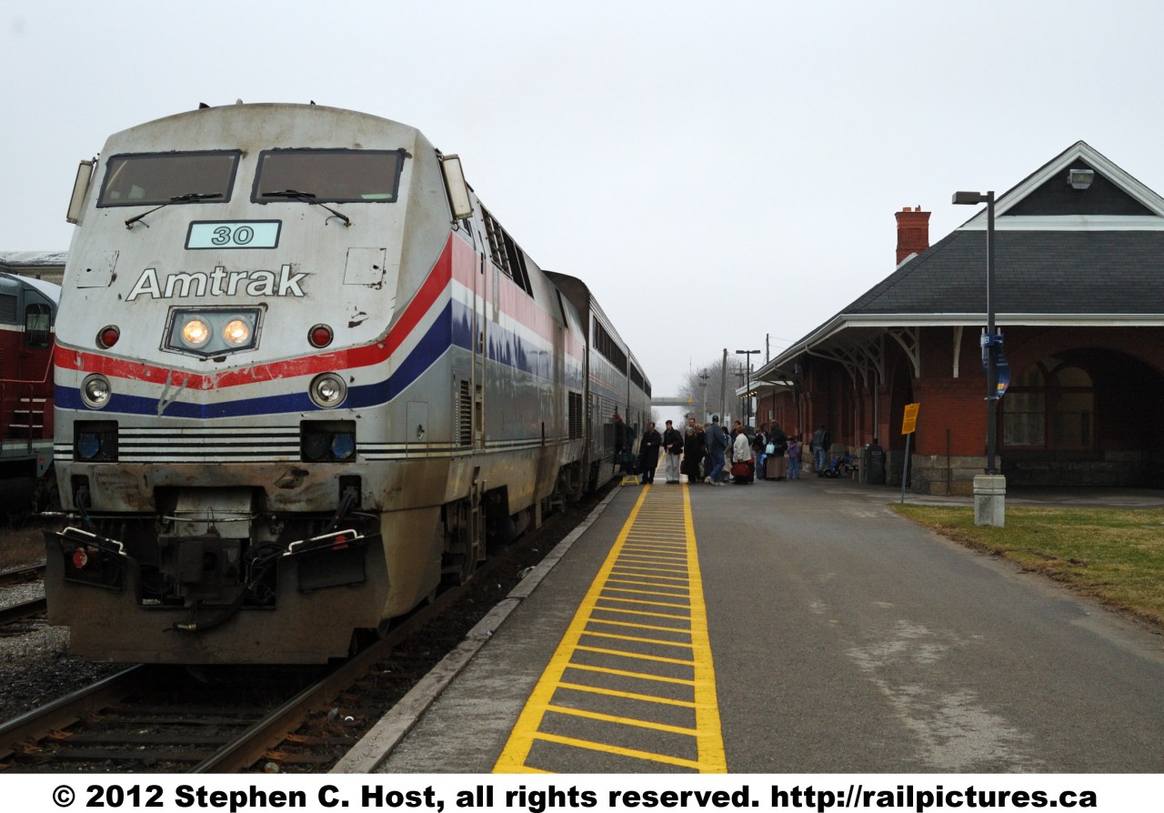 VIA 85, en-route from Toronto to Chicago is stopping at Kitchener to board a decent amount of passengers for points west. Amtrak cancelled the US leg of this train in 2004, VIA moved the schedule back 3 hours later in the year, and now, this train only runs as far as London as the Sarnia leg has been axed by the Conservative Government.