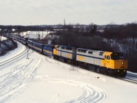 VIA 72 rolls through Hamilton West with a holiday season sized train