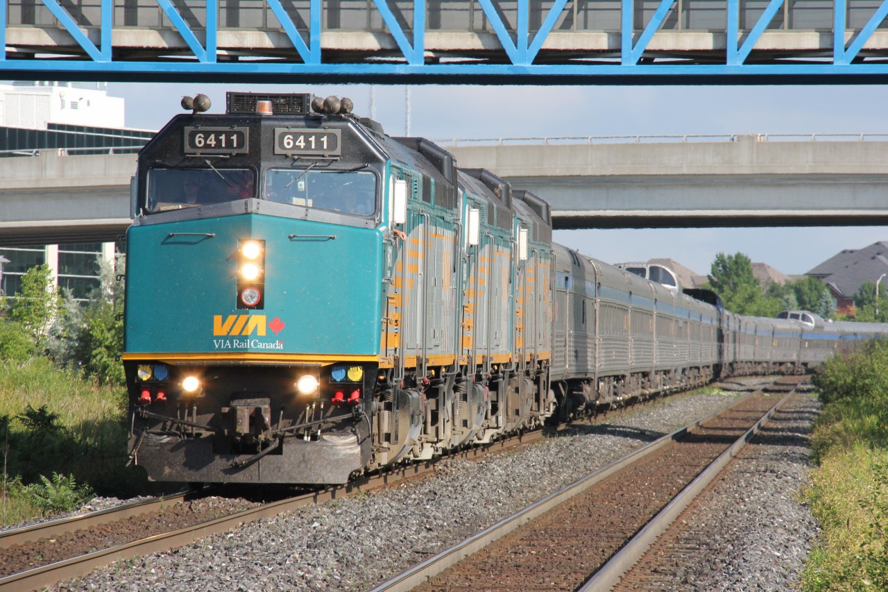 The VIA Canadian glides into Toronto at Yonge Street and Highway 7 in Richmond Hill.