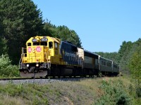 Southbound train #698, The Northlander, gives a nice blast of the horn and a friendly wave on its way out of Huntsville. I was having a hard time finding a good spot to catch the train, not being from the area, but still managed to get this picture off.