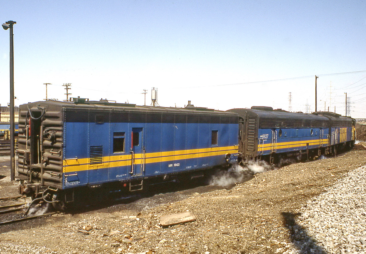Alco steamcar 15423,B-unit 6627 and an FPA-9 on the shop line for the tests,these steam cars were insulated with heater coils inside while the others with port holes were not and very cold inside despite the 2 SGs,like an ill shod shoemaker.