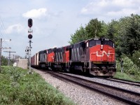 CN 307 enters the old siding slowly with 3514-2118 trailing,this 1 mile side track has been lenghtened to 2½ miles 10 years ago about the lenght of the 120-121 today.