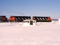 CN 330 going through Lemieux,the lucky guy living there,he,s got 20-25 trains a day in his backyard,a couple years ago,he erected a fence around his yard,maybe he,s tired of that. 