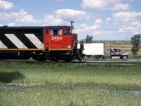 CN 206 goes past the truck stop.